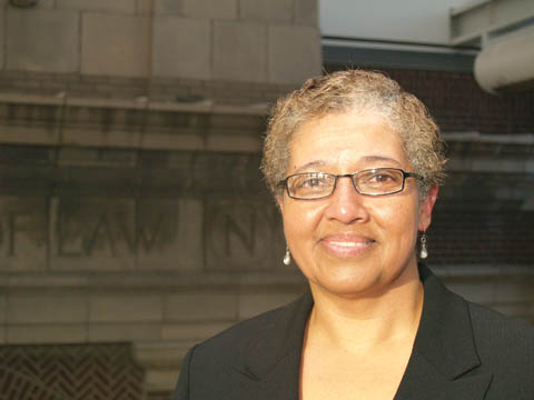 NEW ROLE - Linda Crump, assistant to the chancellor for Equity, Access and Diversity Programs, stands in front of the old...