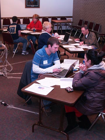 TAX FILERS - Volunteers assist Lincoln-area taxpayers during Student Involvement's first Volunteer Tax Income Assistance session, Jan. 26 in the East...
